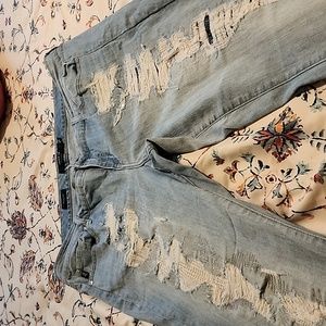Like new stoneware ripped jeans